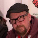 Portrait de Doudou, auteur présent au festival Nouvelle Page 2026 à Verviers.